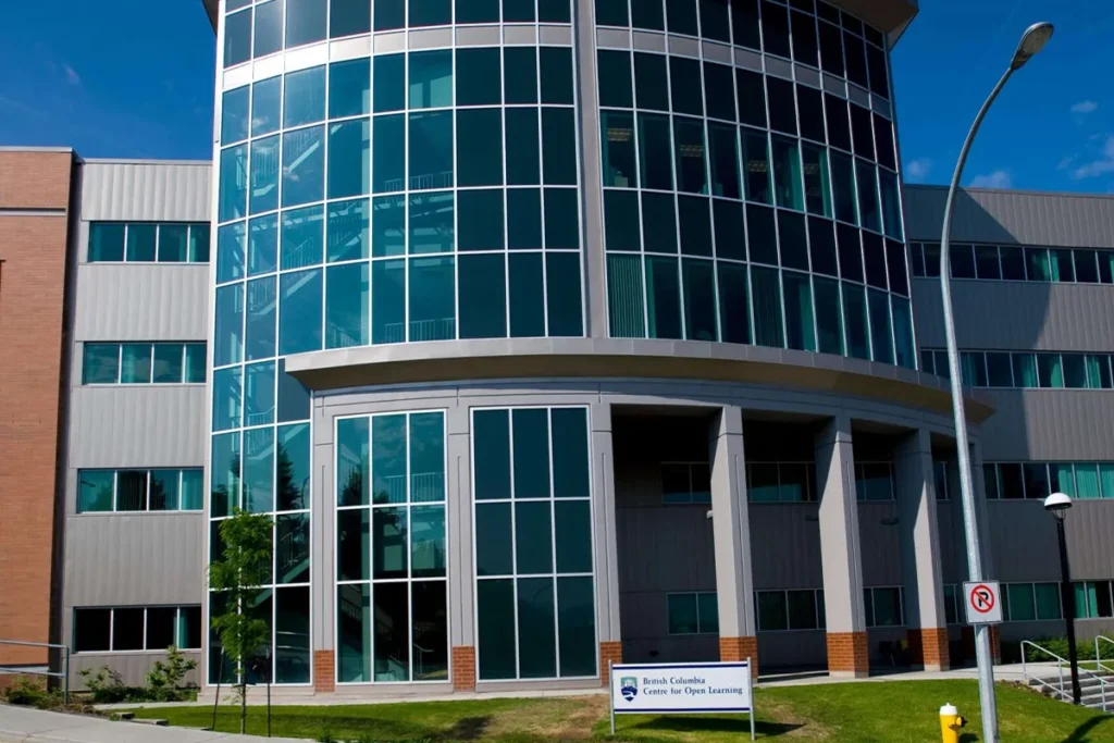 Specialized institutional painting for modern glass buildings at Thompson Rivers University, Kamloops BC.