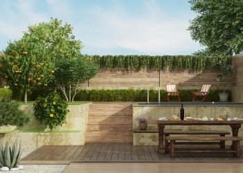 Garden on two levels with old dining table on deck floor